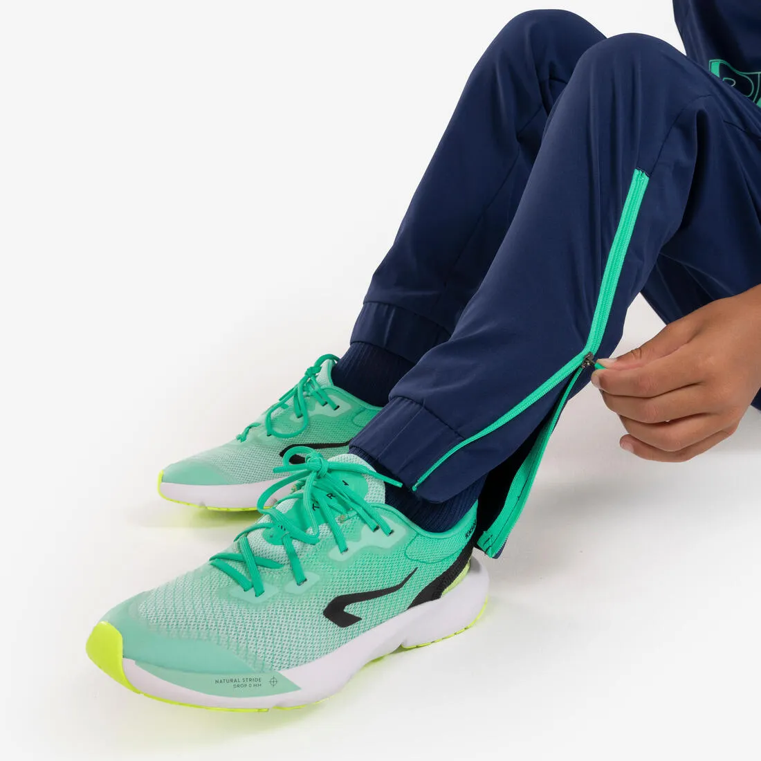 Pantalon de running avec zip Enfant - KIPRUN DRY  marine vert